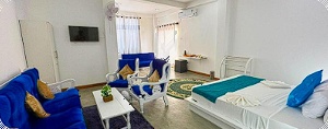Grand Family Suite with King Bed, Lounge Seating and Balcony